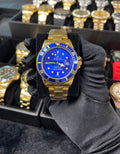 Reloj Rolex Dorado con Azul