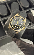 Reloj Rolex Negro con Dorado